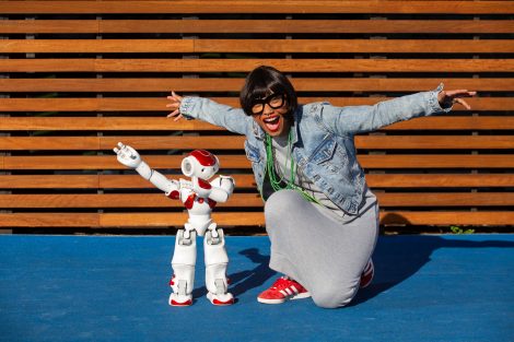 INNER WEST COURIER/AAP MC Mirrah with Ruby the robot at The Connection in Rhodes, NSW. Thursday 6th June 2019. Mirrah will join this year's Human Robot Friendship Ball as part of Vivid Live. (AAP IMAGE/Jordan Shields)